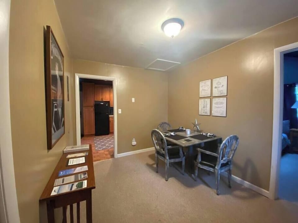 Dining room table for 4. Washer and Dryer also in closet for guest use. 