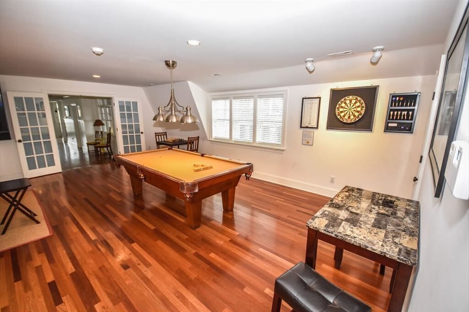 Fun-filled game room with a pool table and dartboard – great for family entertainment nights.