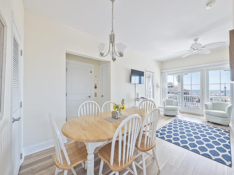 Feel the ocean breeze while savoring your morning coffee in this bright, airy space.