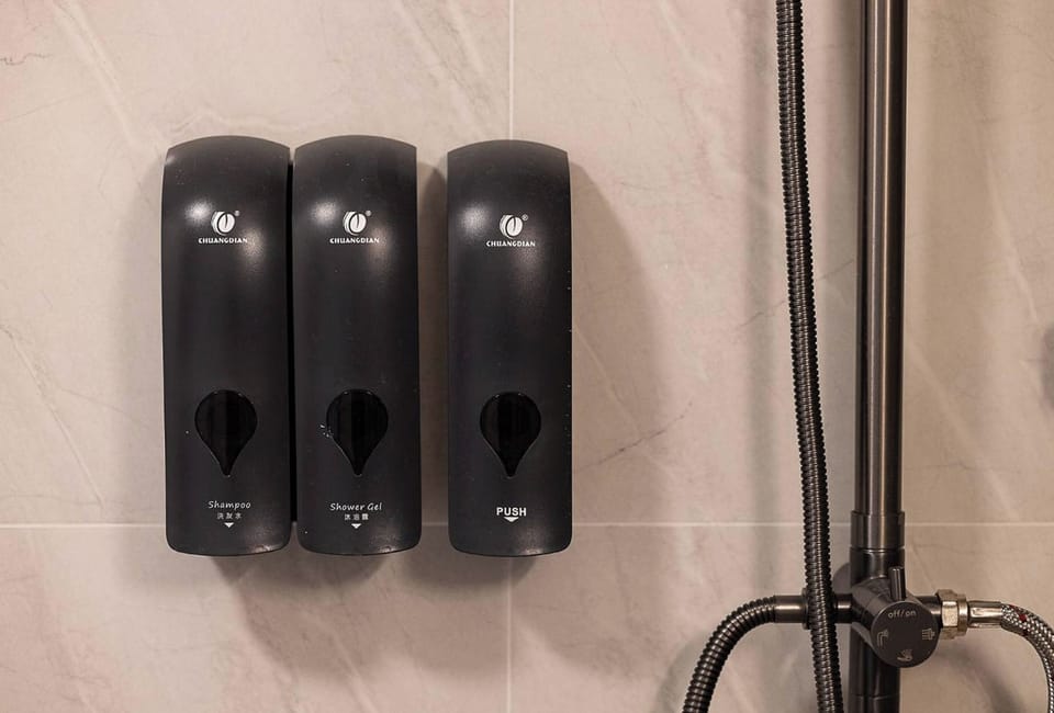 Shower, rainfall showerhead, free toiletries, hair dryer