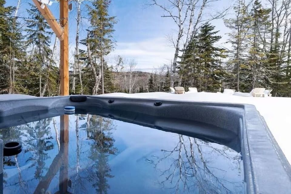 End your day with a soak under the stars.