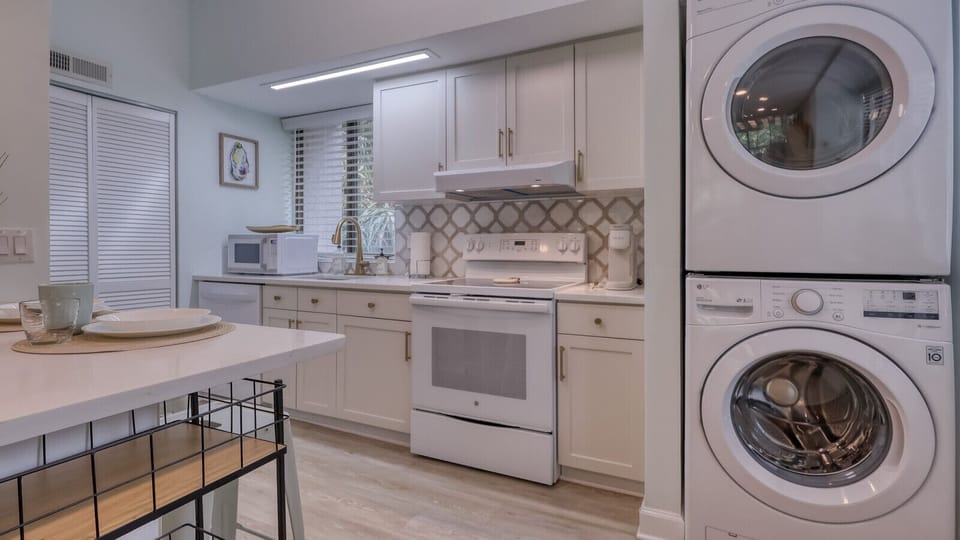 Kitchen with Dining Bar and In-Unit Laundry