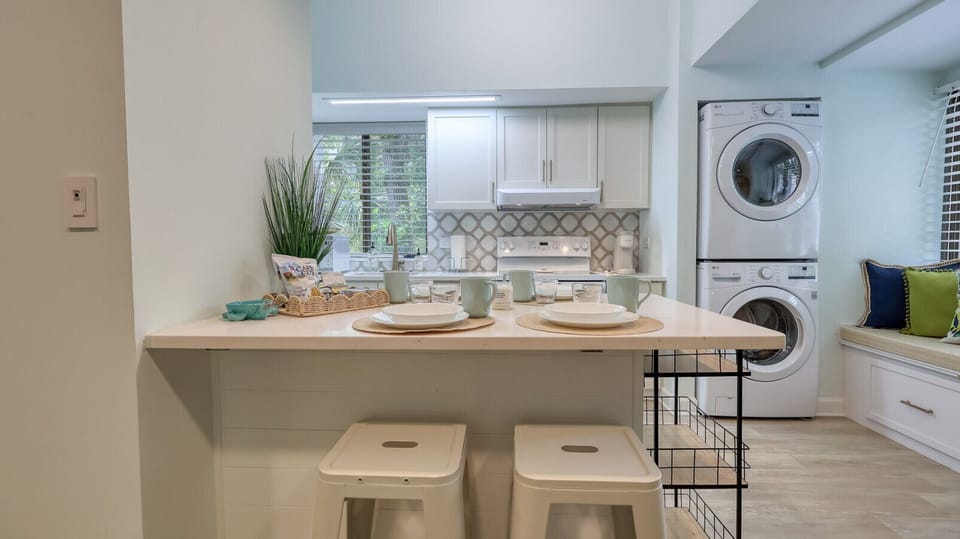 Kitchen with Dining Bar and In-Unit Laundry