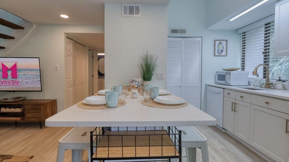Kitchen with Dining Bar and In-Unit Laundry