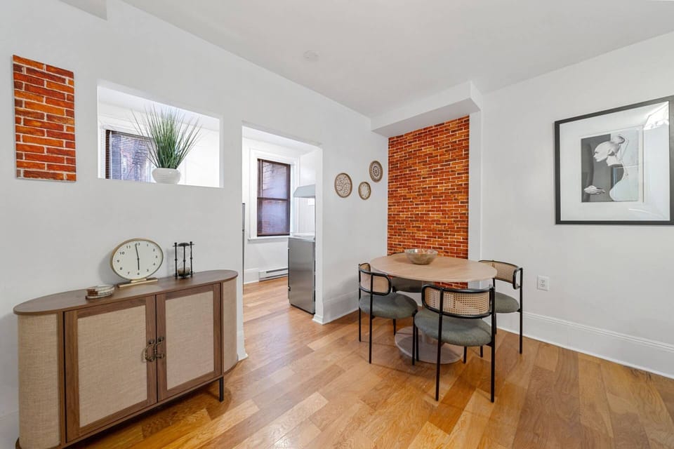 View of the dining table and into the fully equipped kitchen