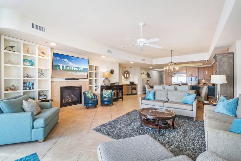Exclusive Condo, 3 Bedrooms, Hot Tub, Beach View | Living room | 70-inch Smart TV with cable channels, fireplace