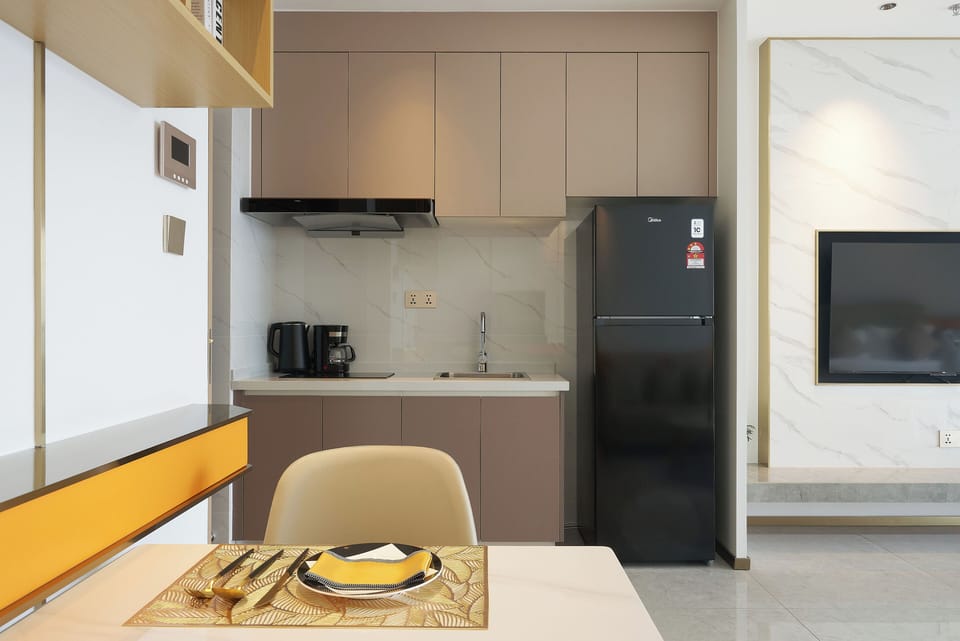 Studio, River View | Private kitchen | Fridge, dining tables