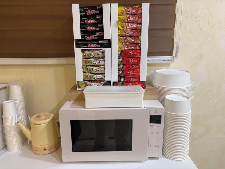 Mini-fridge, microwave, stovetop, coffee/tea maker