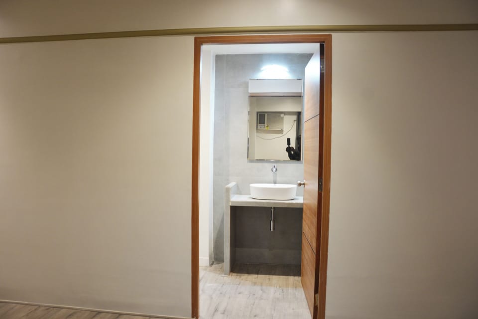 Family Quadruple Room | Bathroom | Shower, towels, soap, shampoo