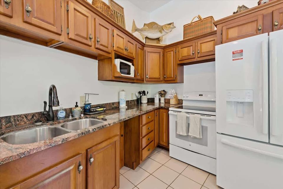 Kitchen: Cook up delicious meals in this fully-equipped space with rustic charm!