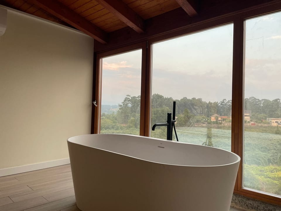 Deluxe Double Room, Bathtub | Desk, laptop workspace
