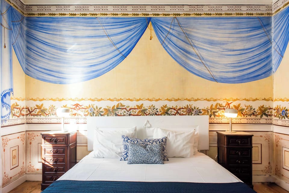 Santo Antonio 1 elegant, antique-style bedroom