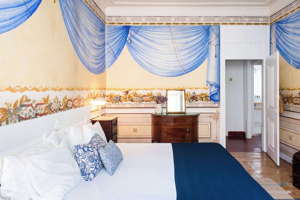 Santo Antonio 1 elegant, antique-style bedroom