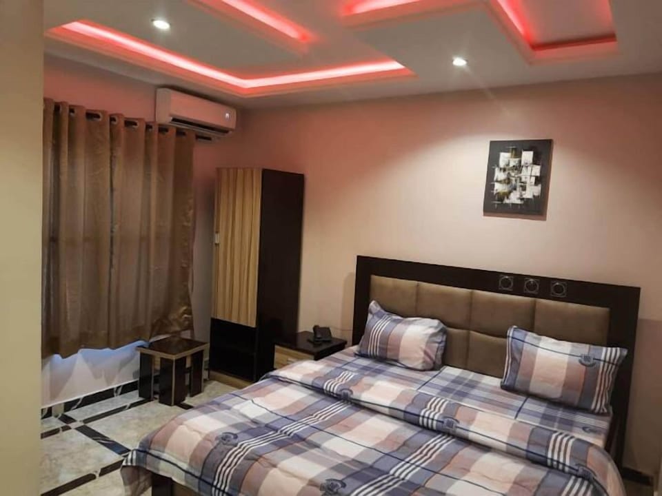 Economy Room, Balcony, City View | Desk, laptop workspace, blackout drapes, soundproofing