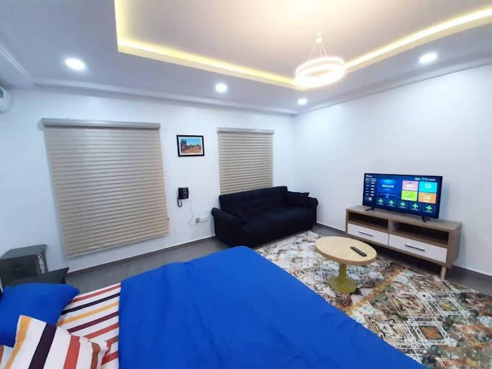 Economy Room, Balcony, City View | Desk, laptop workspace, blackout drapes, soundproofing