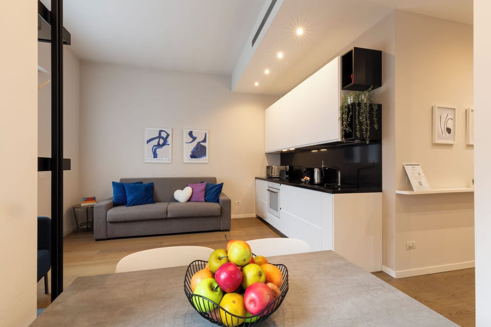 Deluxe Apartment, City View | Living area | 50-inch Smart TV with digital channels