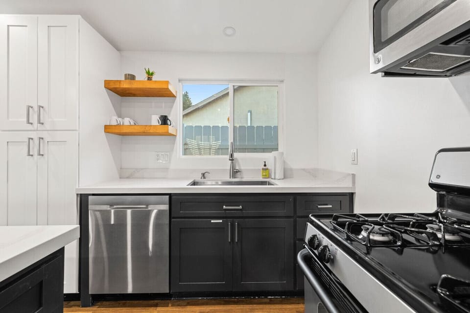 Sleek and fully-equipped kitchen—perfect for whipping up delicious meals and creating memorable moments.