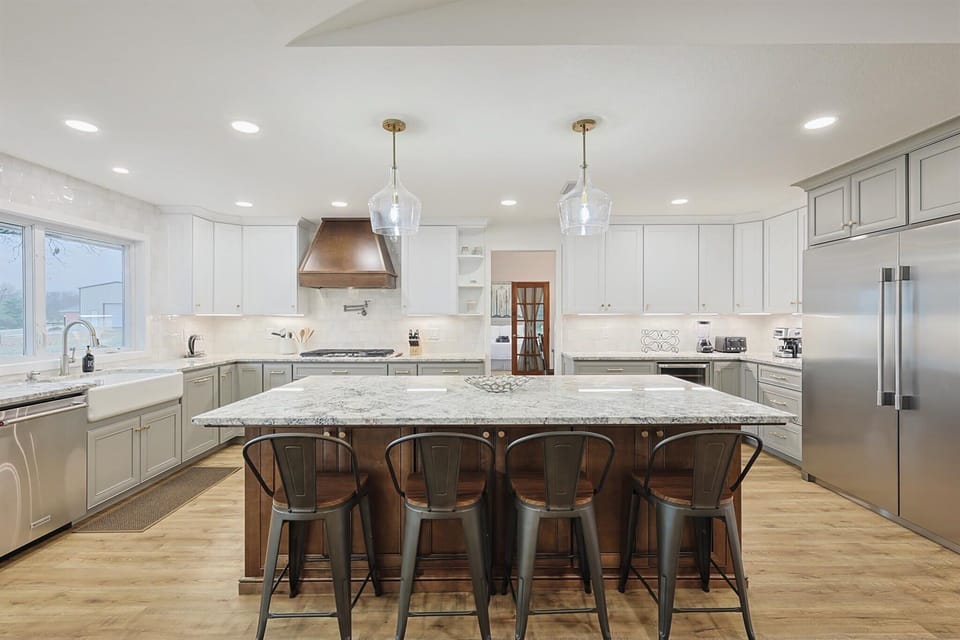 You’ll want to spend as much time as possible in this spectacular dream kitchen! With an oversized center island, oversized fridge, and top-end appliances, what more could one ask for?!