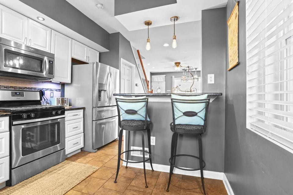 Modern kitchen stocked for cooking during your stay
