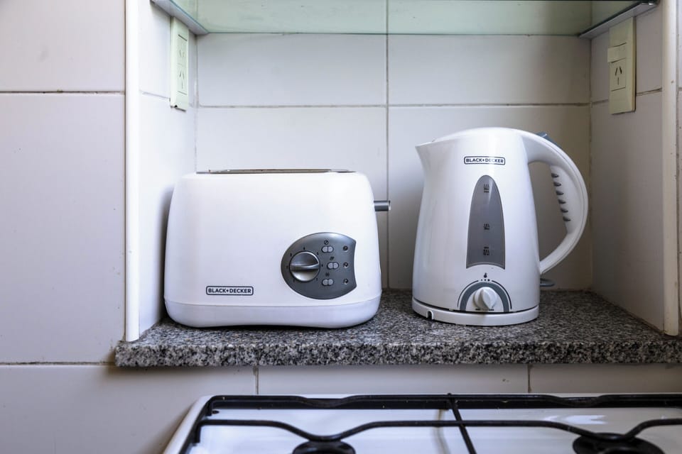Studio, Balcony, City View | Private kitchen | Full-size fridge, microwave, oven, stovetop