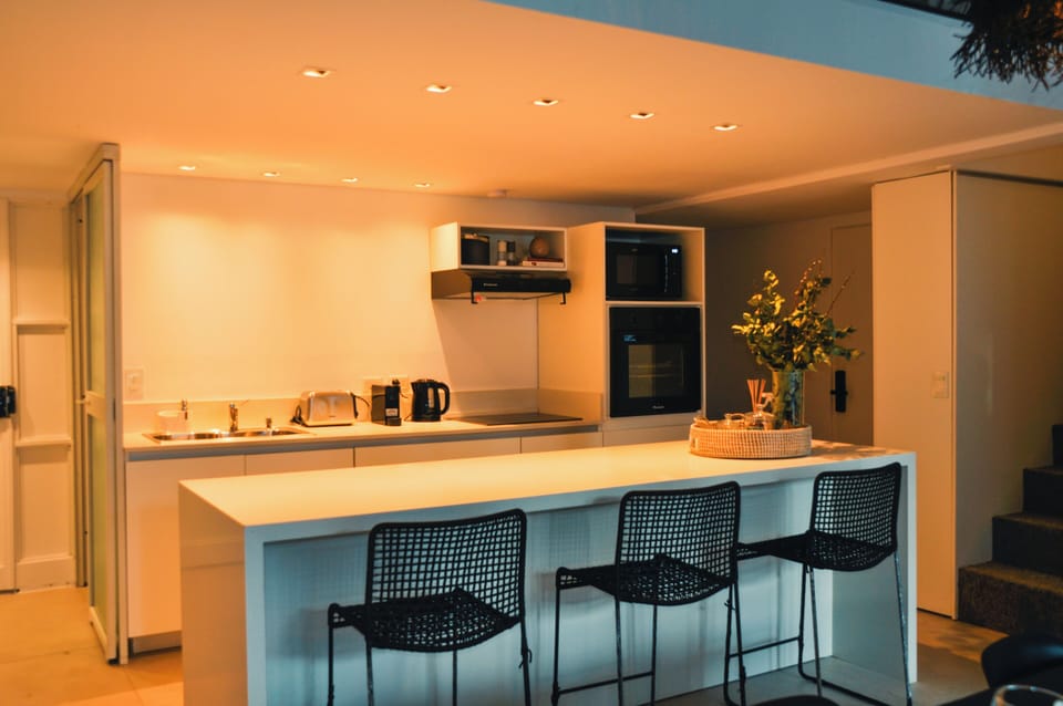 Deluxe Apartment, 3 Bedrooms, Balcony, Pool View | Private kitchen | Microwave, oven, stovetop, espresso maker
