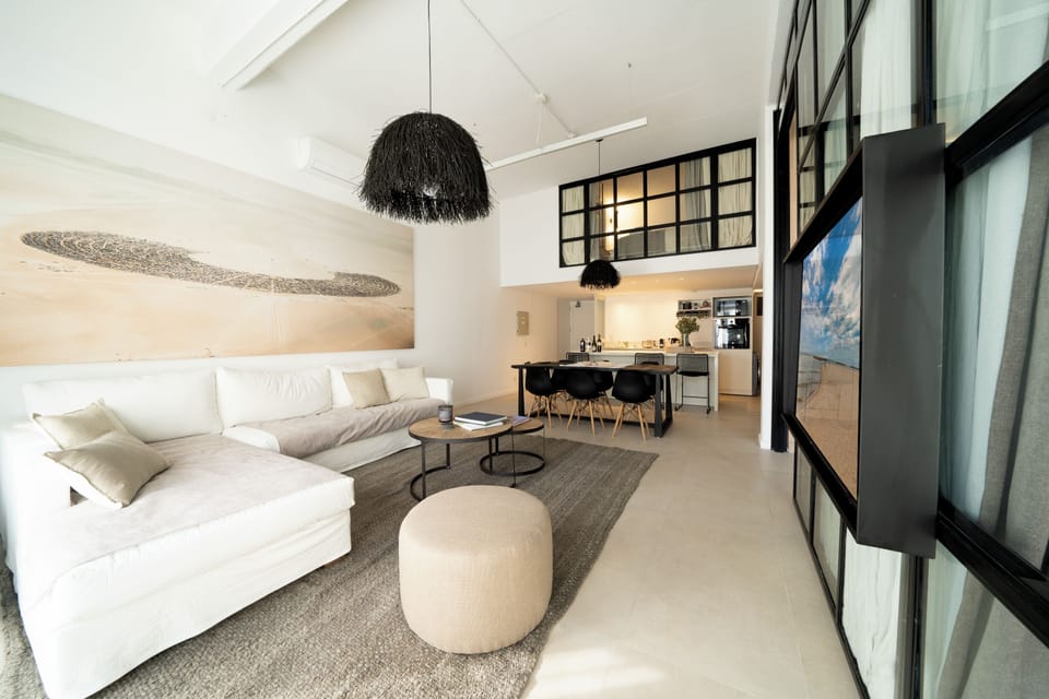 Deluxe Apartment, 3 Bedrooms, Balcony, Pool View | Living area | 42-inch Smart TV with cable channels, Netflix, pay movies