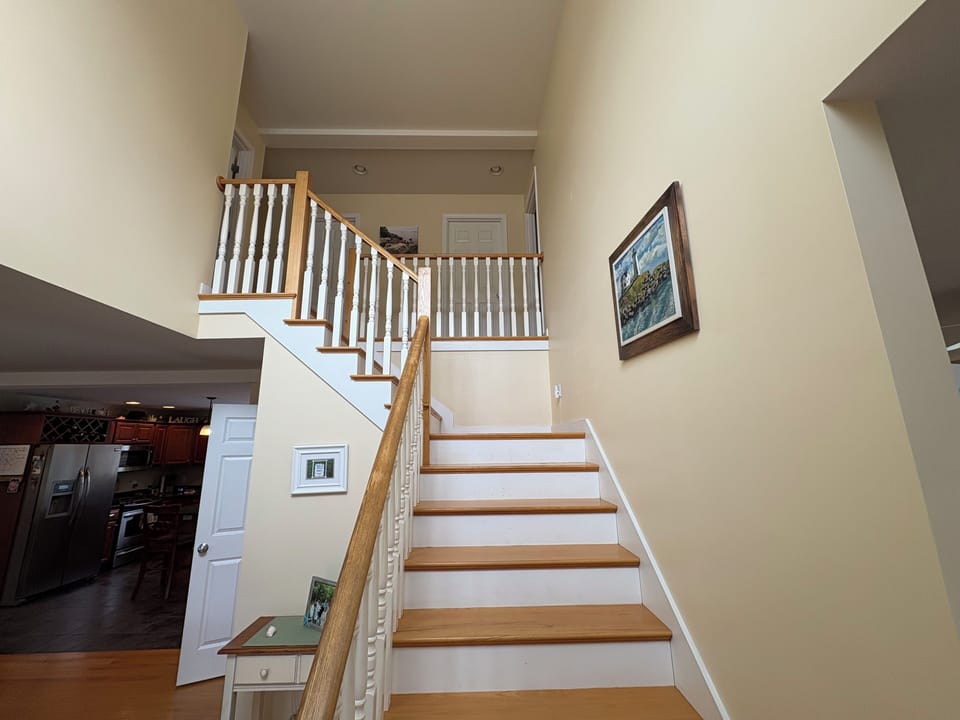 Stairs going up to bedrooms