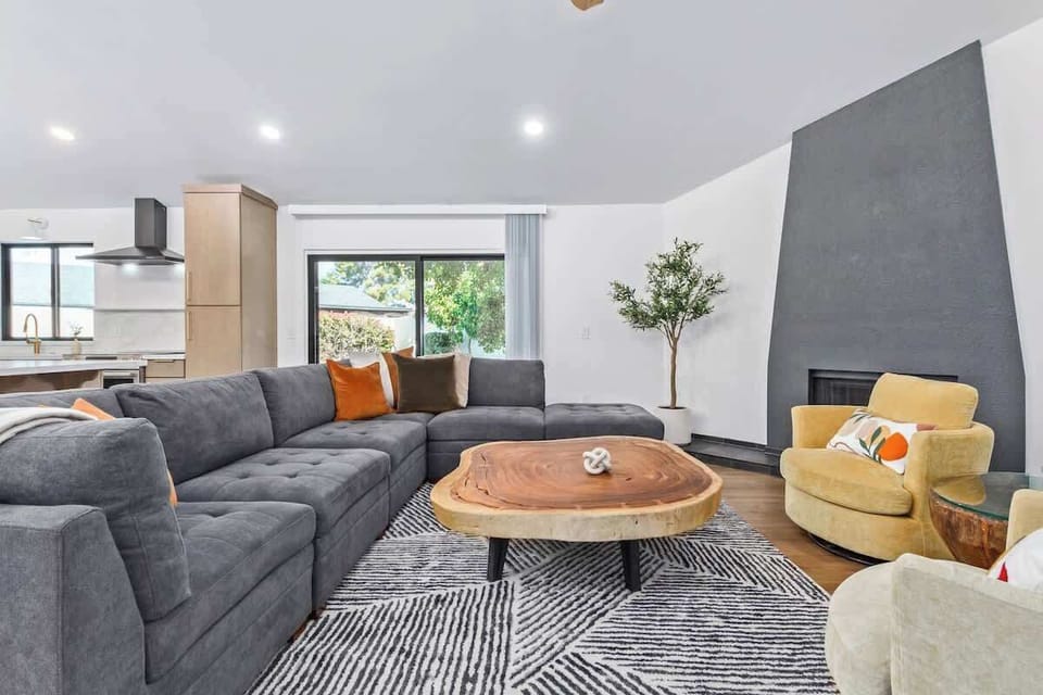 Cozy and inviting living room with gas indoor firepit.
