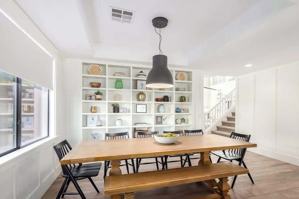 Dining room with an aesthetic showcase.