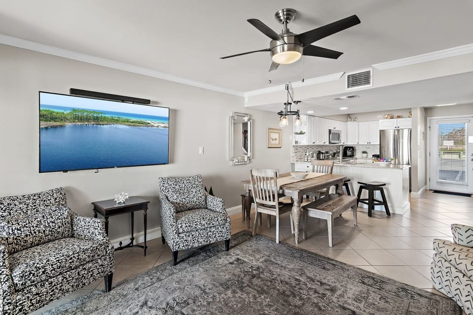 2nd Floor has the Primary Living Space with a comfortable, Gulf View living room w/ 55" Smart TV, Remodeled Kitchen, Dining Space, and Half Bath.