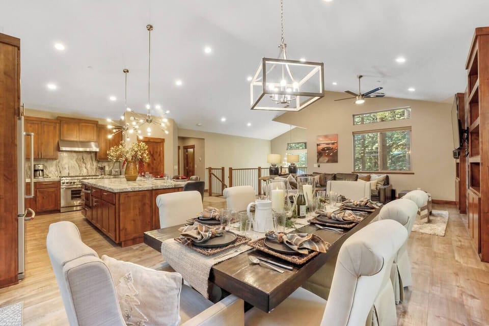 Dining table with seating for 8. Please note the table is staged and won't be set like this upon arrival. 