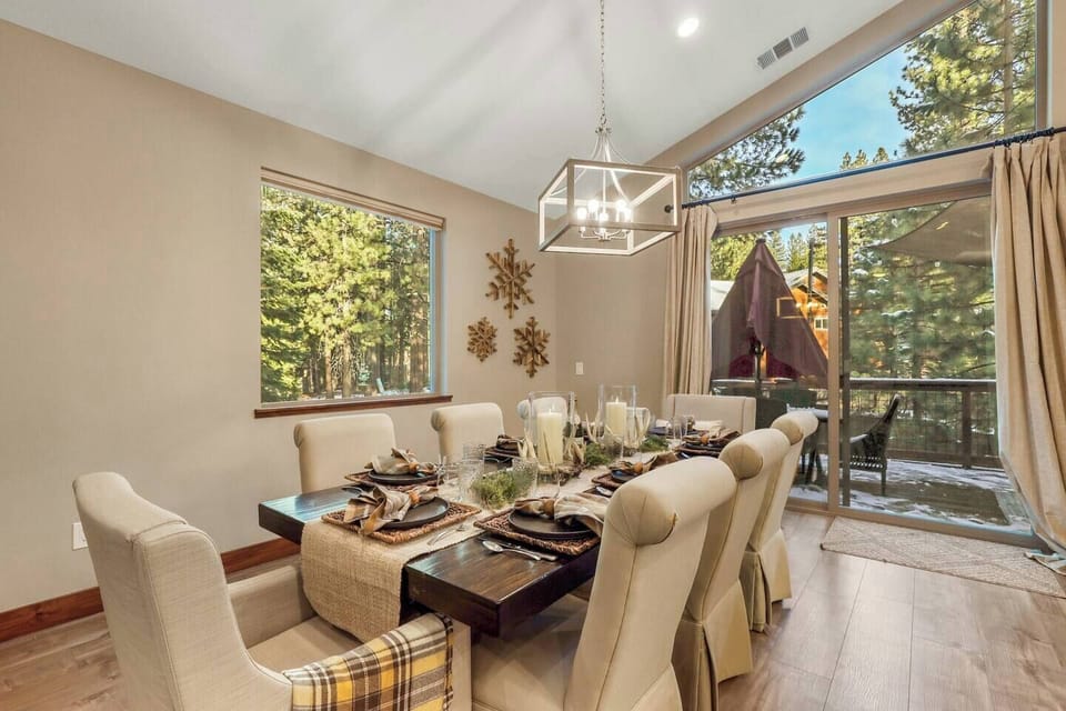 Dining table with seating for 8. Please note the table is staged and won't be set like this upon arrival. 