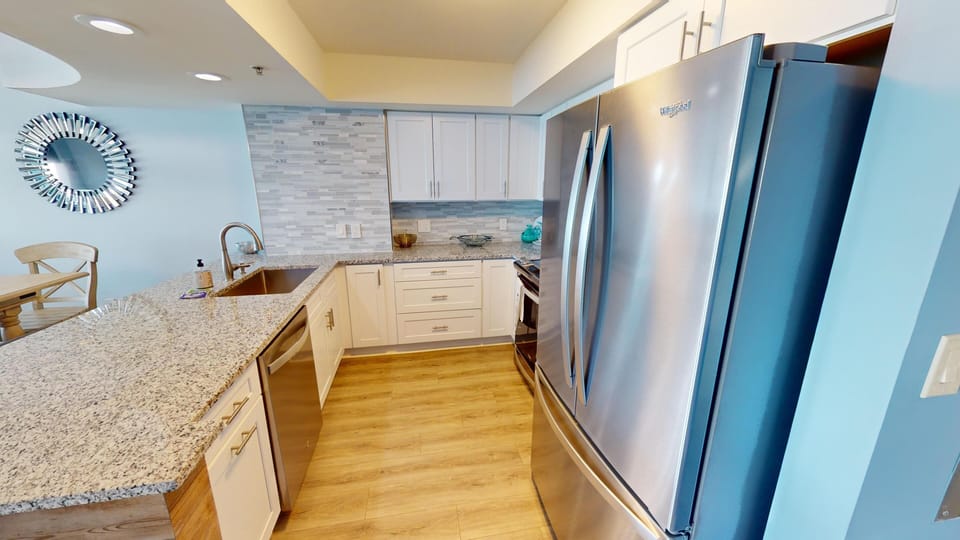 Kitchen - Kitchen with full appliances, cookware, and counter space for preparing meals and snacks during your stay.