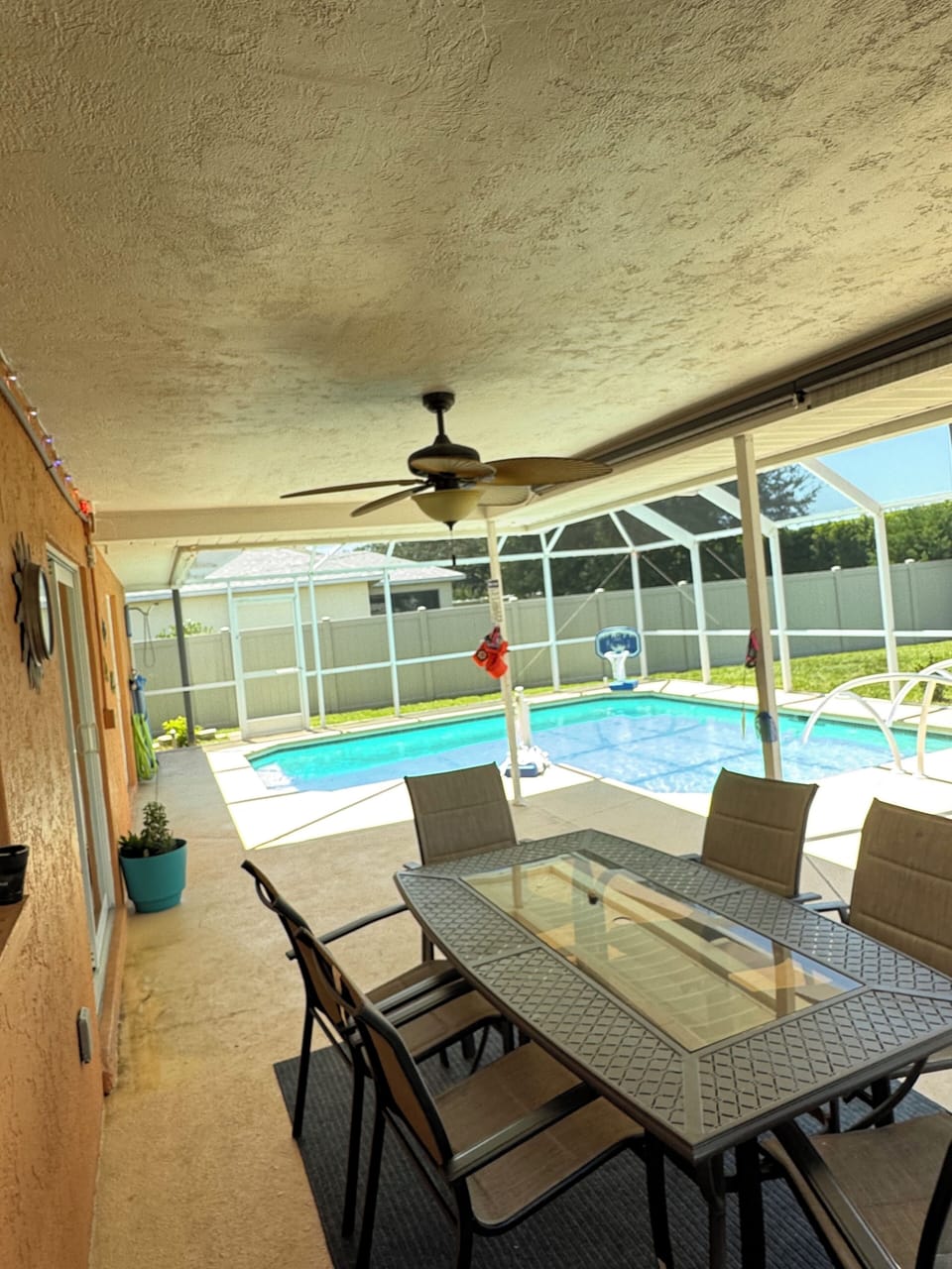Covered Out Door Table, chairs with Fan and Lights for comfort and two shade