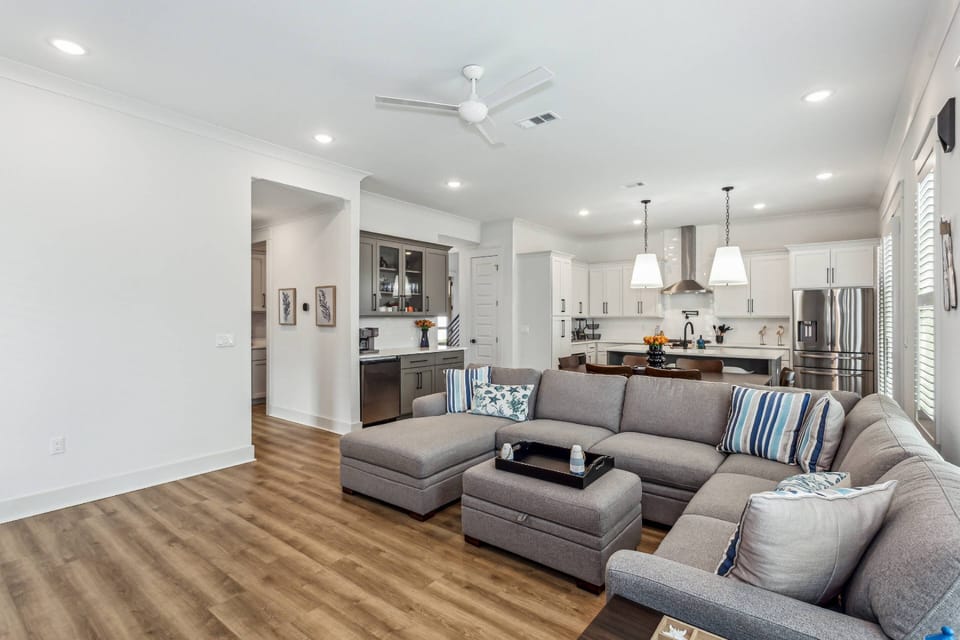 Living area includes  a separate bar area with ice maker