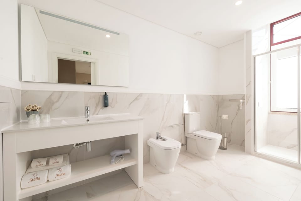 Rainfall showerhead, designer toiletries, hair dryer, bidet