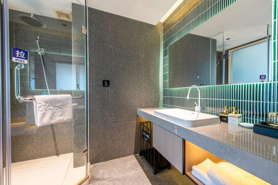 Hair dryer, slippers, towels, soap