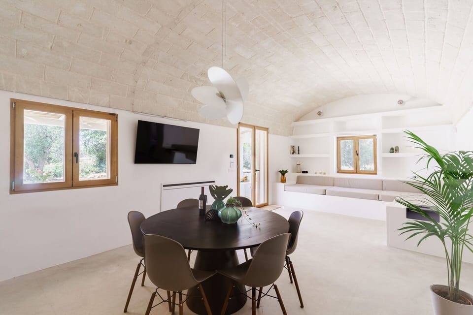 Flooring, Interior Design, Furniture, Ceiling, Floor, Lighting, Room, Light Fixture, Chair, Living Room