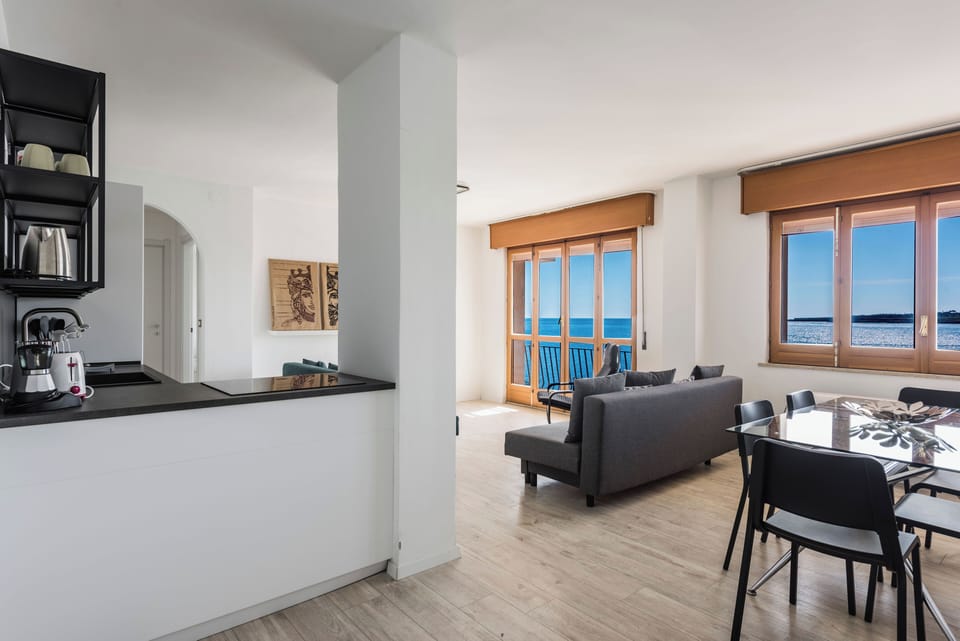 Apartment, Balcony, Sea View | Living area | TV