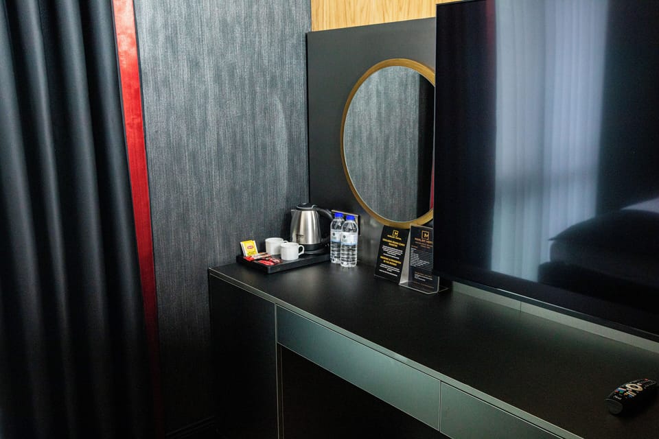 In-room safe, laptop workspace, blackout drapes, soundproofing