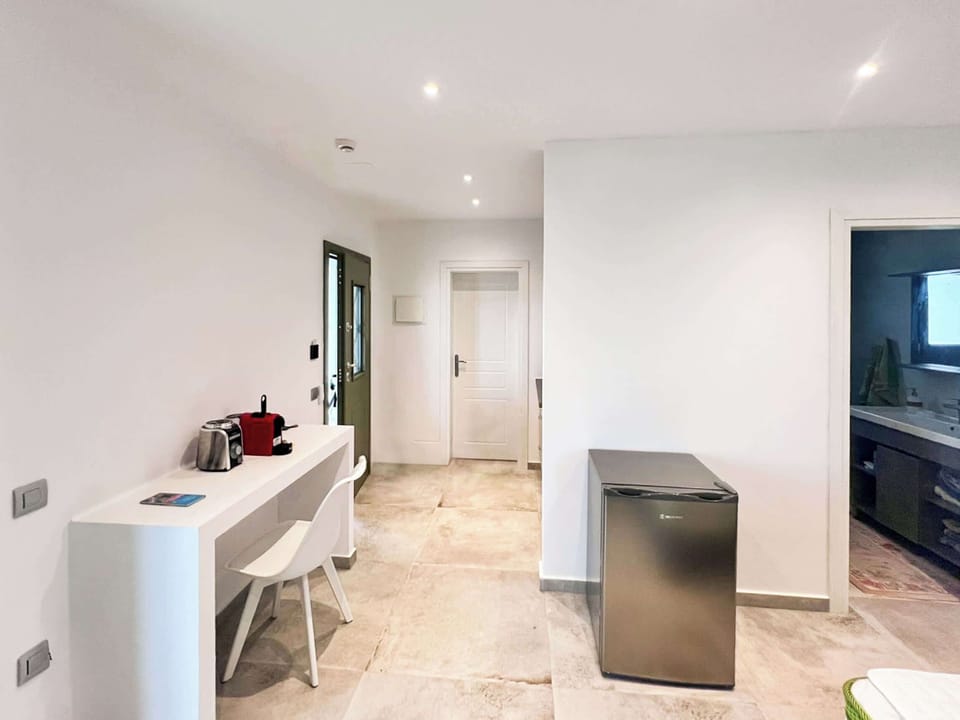 Interior Overview – Kitchen and Living Transition
A connected, functional space with clean aesthetics and island-inspired colors.