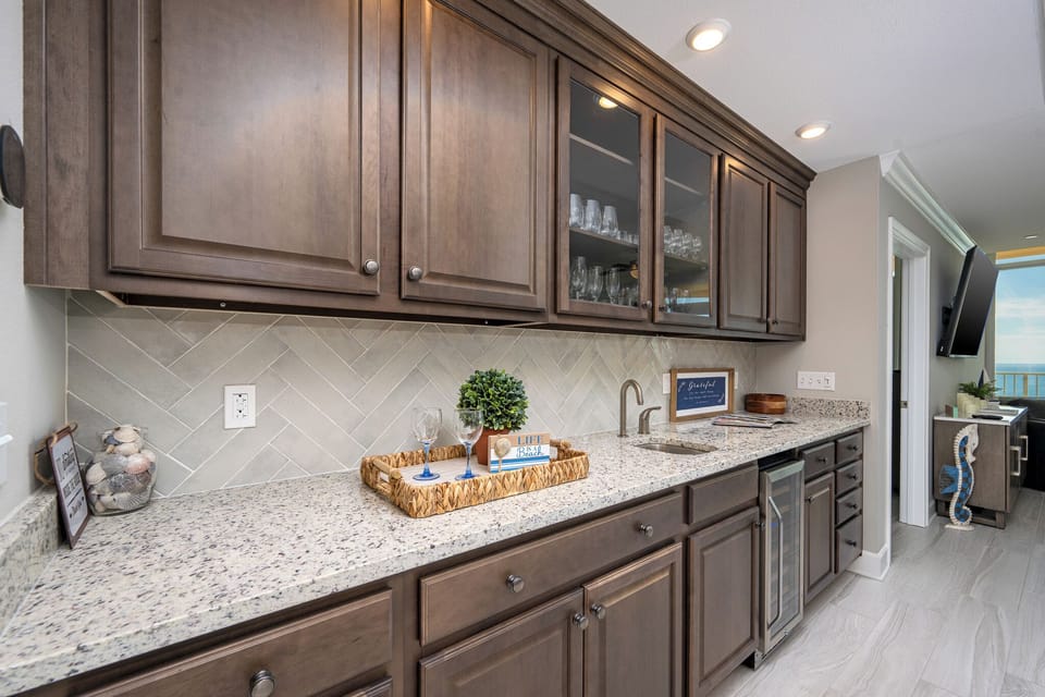 Grab a chilled bottle from the wine cooler or create your favorite cocktail at the wet bar