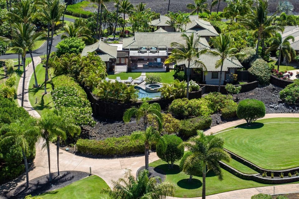 Tropical paradise awaits—lush grounds, private pools, and ultimate privacy at Champion Ridge.