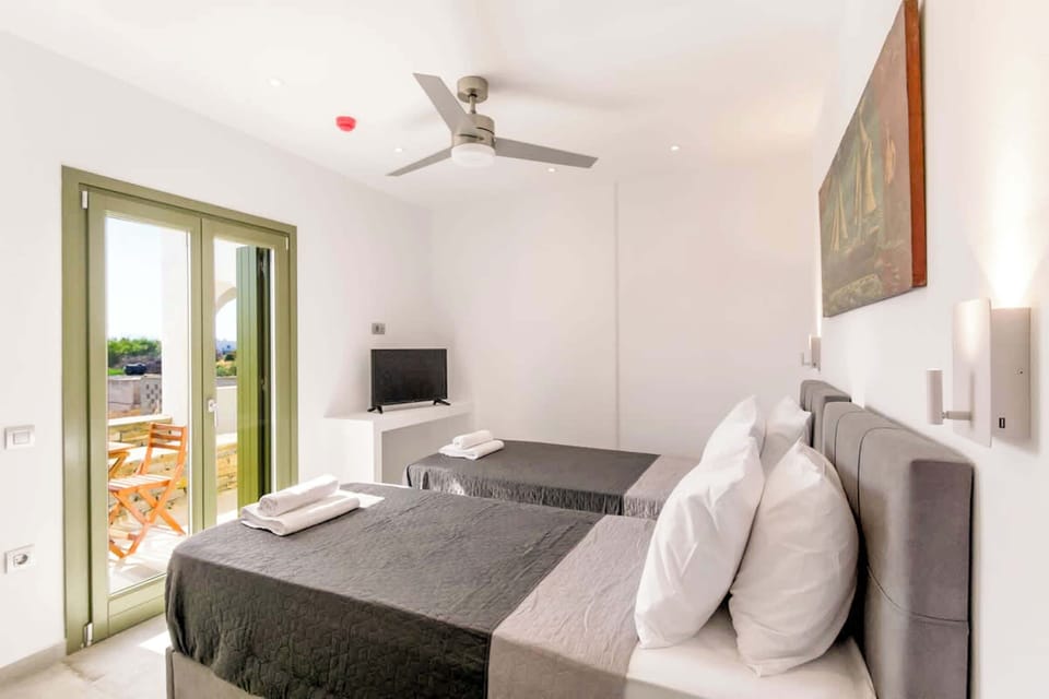 View of the interiorInterior View – Access to Patio and Double Bed Setup
Blends indoor comfort with outdoor access, perfect for couples.