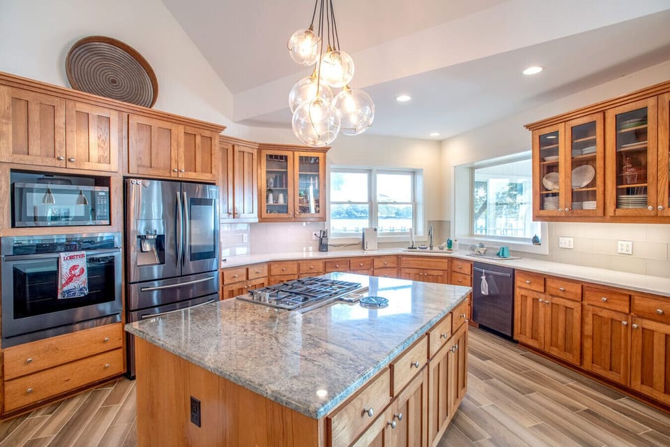 A spacious chef’s kitchen with large island—perfect for cooking and gathering
