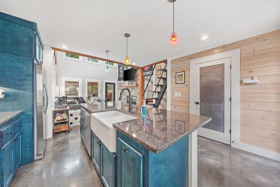 Fully equipped kitchen with stylish lighting 