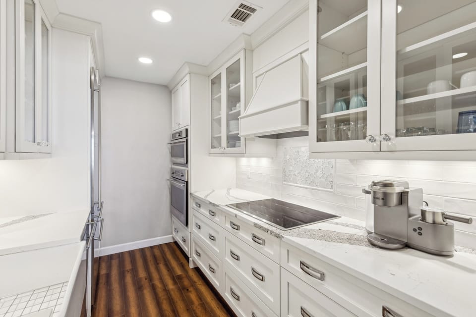 Fully stocked kitchen with stainless steel appliances