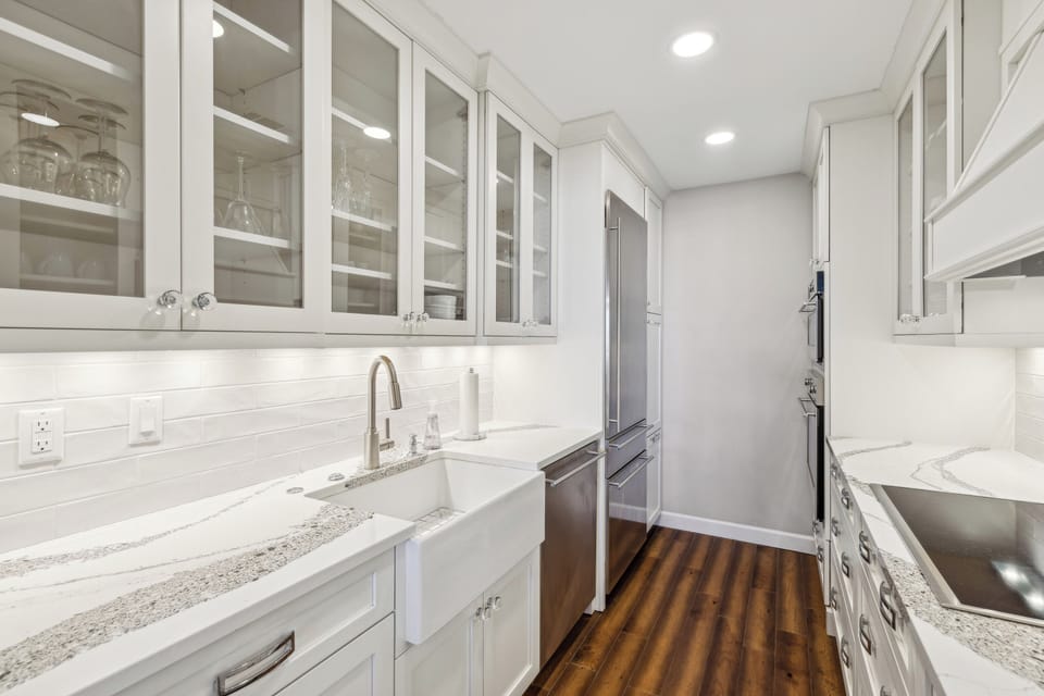 Fully stocked kitchen with stainless steel appliances