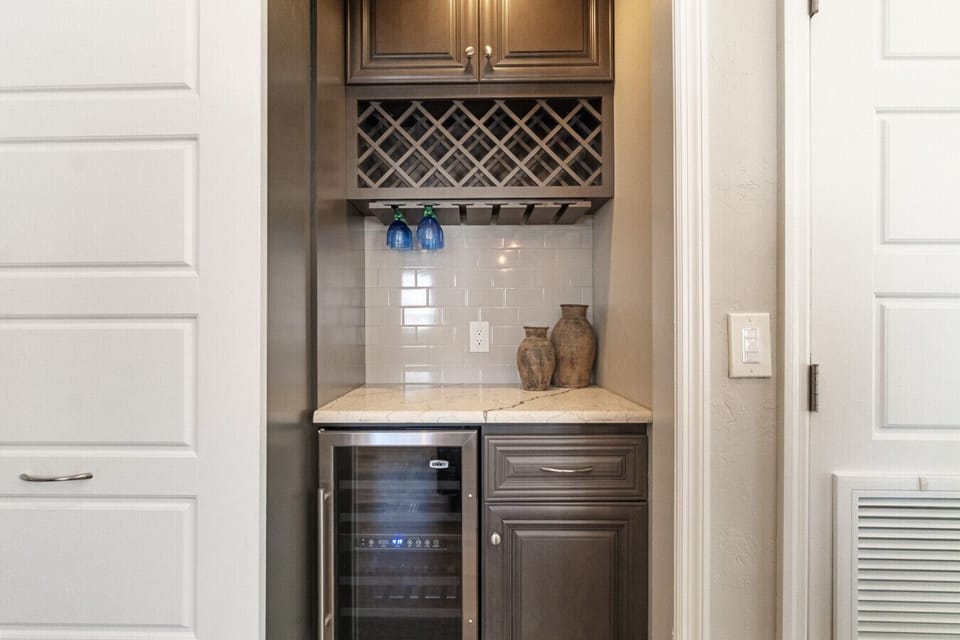 A charming little wine nook perfect for unwinding after a sunny day at the beach. 🍷✨