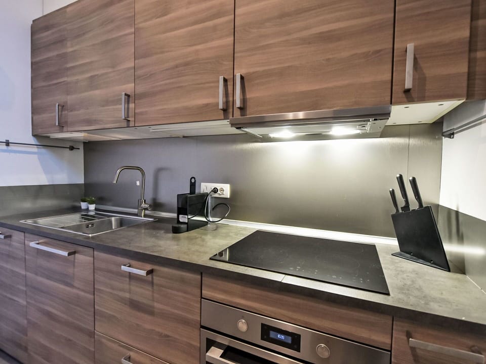 Kitchen, Countertop, Cabinetry, Kitchen Appliance, Flooring, Interior Design, Kitchen Sink, Wood, Major Appliance, Furniture